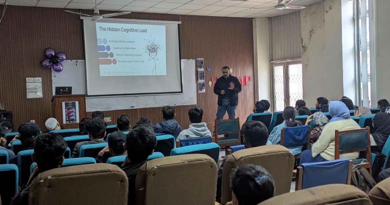 University professor teaching students in a lecture hall